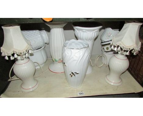 A mixed lot of vases, lamp bases etc.,
