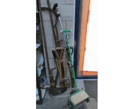 A large quantity of garden tools.
