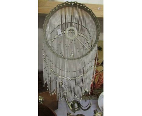A beaded light fitting.