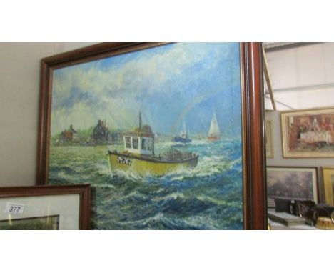 A framed oil on canvas seascape signed Andrew Kenroy.