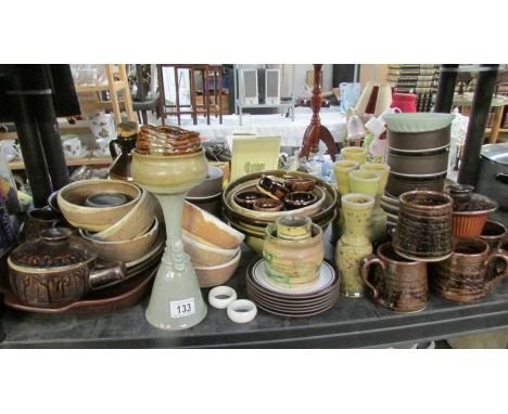 A shelf of assorted stoneware etc.,