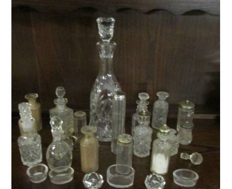 A glass decanter and a mixed lot of cruet bottles etc.,