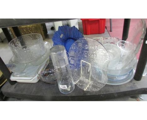 A shelf of glass ware.