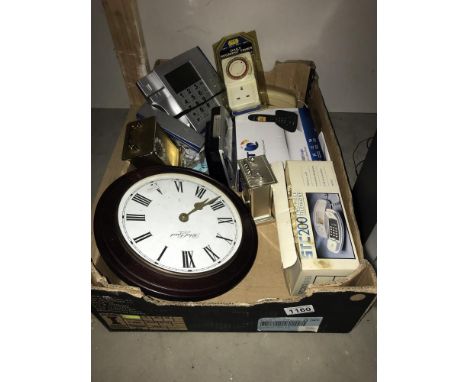 A box of telephones and clocks (4 of each) and a timer