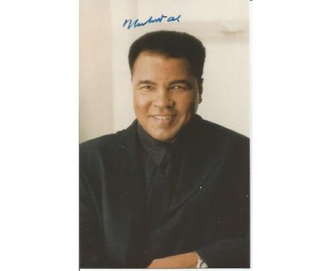 Muhammed Ali signed small 6 x 4 colour portrait photo. Good Condition. All signed items come with our certificate of authenti