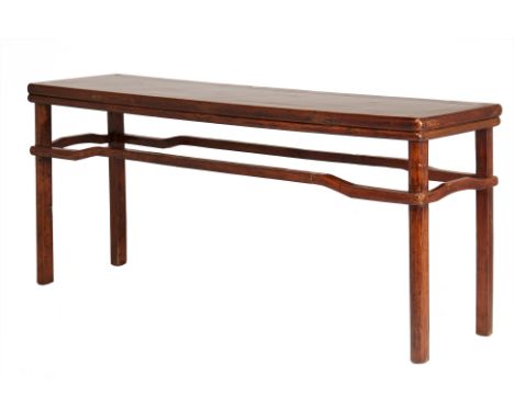 A LARGE CHINESE WALNUT ALTAR OR SCROLL TABLE
The rounded supports joined by humpback stretcher rails
88cm high x 221cm wide x