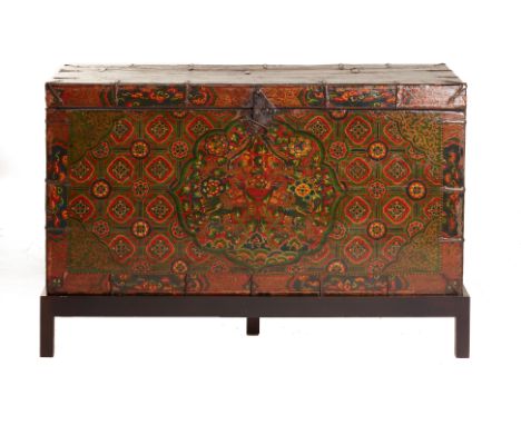 A PAINTED TIBETAN TRUNK
On a contemporary stand, painted with foliage and dragons
88cm high x 132cm wide x 51cm deep
Conditio