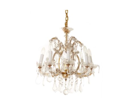 A GILT-METAL AND CUT GLASS CHANDELIER
Of 19th Century style, eight light with variously shaped glass drops
50cm high x 49cm w