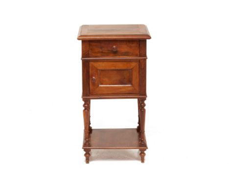 A WALNUT BEDSIDE TABLE
Fitted with a single drawer to one end , a cupboard door and a further shelf below, on turned supports