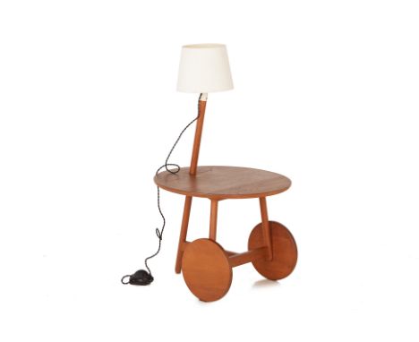 AN UNUSUAL CIRCULAR SIDE TABLE WITH LAMP
With integral lamp, the supports with fixed wheels
Total height 104cm x 48cm wide
Co