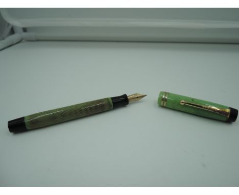 A Parker Duofold Pastel fountain pen, circa 1920, Apple Green, medium nib, button fill, very good condition, rare colour, mad