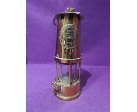 A brass bodied miners lamp type 6 no. B/28 Eccles
