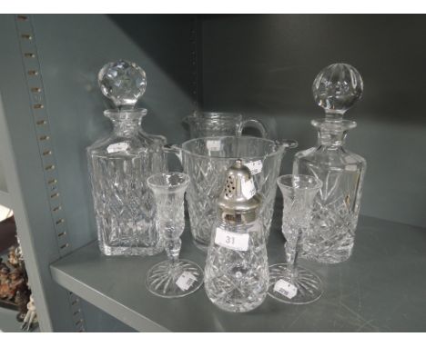 A selection of clear cut glass wares including decanter and sifter