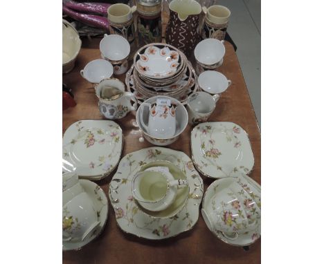 A selection of tea cups and saucers including Sutherland China