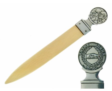 Edward VIII ivory paperknife, the silver medallic handle decorated to one side with the motto Entre Nous and a pair of claspe