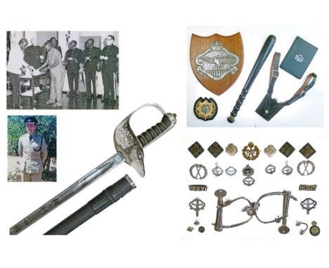 Zambian army sword by Wilkinson with Zambian arms on blade and guard, blade numbered 92036 (1968), together with truncheon, h