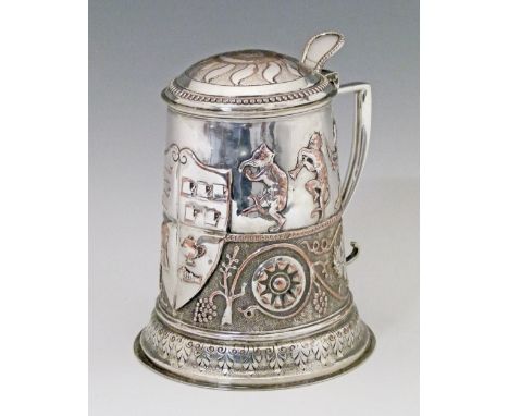 Late 19th/early 20th Century silver plated lidded tankard decorated in low relief with dancing cats, monkeys and foxes, a sty