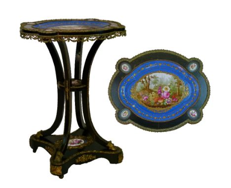 19th Century French cast brass mounted ebonised occasional table, the shaped oval top inset with a Sevres style painted porce