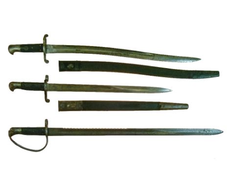 Three bayonets - An English pattern 1879 artillery sword bayonet 65cm saw-backed blade, an English pattern 1856 sword bayonet