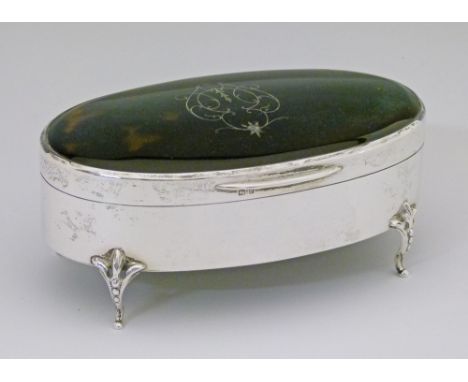 George V silver and tortoiseshell oval trinket box standing on pierced splayed feet, makers Collett & Anderson, London 1930, 