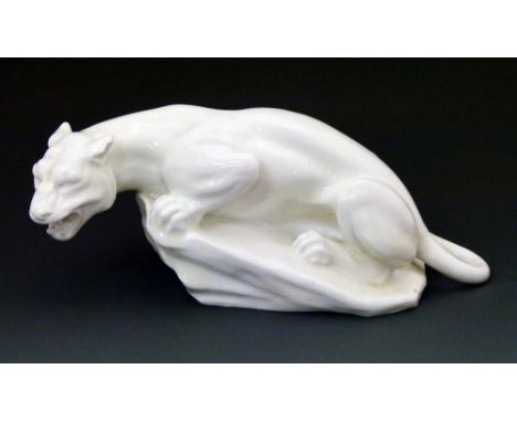 Royal Doulton figure depicting a tiger crouched on a rock, rare white colourway, designed by Charles Noke, base with printed 