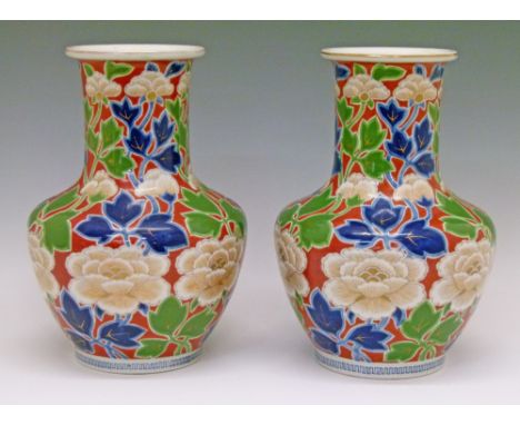 Pair of Arita baluster shaped vases by Fukagawa Seiji, Meiji period, having floral decoration in blue, white, green and gilt 