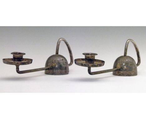 Pair of early 20th Century Carl Deffner silver plated Modernist style chamber candlesticks, each having a high loop handle, d