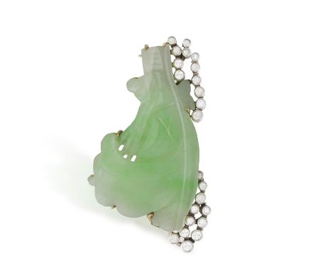 A JADE AND DIAMOND BROOCH, the carved plaque highlighted with brilliant-cut diamonds, length approx. 4.1cm* This lot is sold 