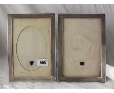 Good quality rectangular engine turned photo frames, 8” high Lon 1918 by WFW        