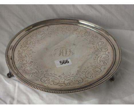 Georgian waiter with beaded rim, raised on fluted bracket feet, 9.5” dia. Lon 1777 by RM &amp; RC 480g.     