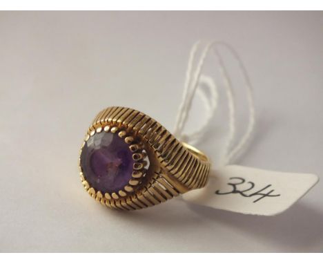 Heavy 18ct gold and amethyst ring  approx size P  8.3g inc       