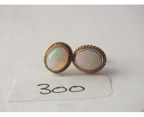 Pair 9ct opal ear studs       