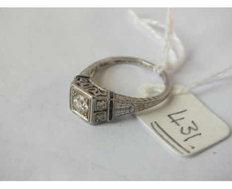 AN ART DECO DIAMOND RING with sapphire shoulders set in platinum (stone missing), size L+     