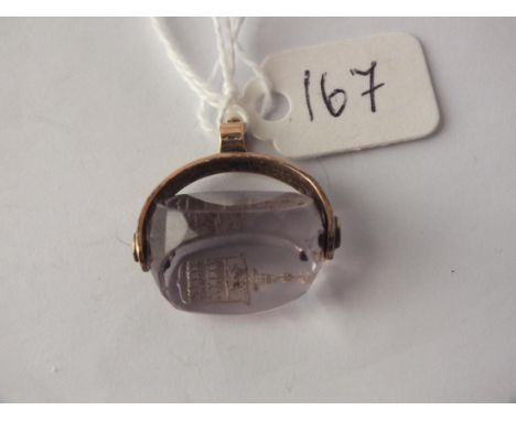 Antique gold and amethyst swivel seal   carved with armorial intaglio        