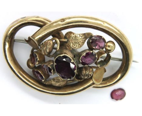 Victorian pinchbeck amethyst set brooch, missing one stone. P&amp;P Group 1 (£14+VAT for the first lot and £1+VAT for subsequ