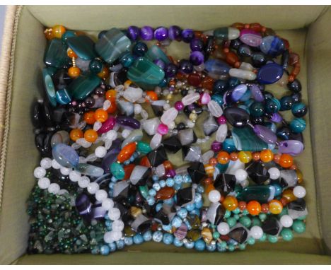 A collection of agate, quartz, jade and garnet jewellery 