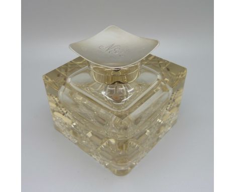 A large silver topped glass inkwell, Birmingham 1925, with inscription dated 1942, base 8.5cm x 8.5cm, top requires re-attach
