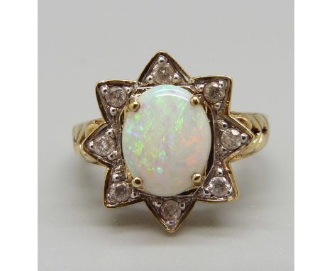 A 9ct gold, opal and diamond cluster ring, 4.4g, N, opal approximately 8mm x 10mm 