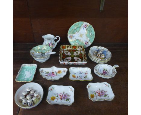 A collection of Royal Crown Derby and Abbeydale pin trays, jug, Royal Worcester cup and saucer, thimbles, etc. 