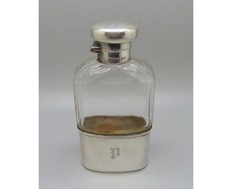 A cut glass and silver hip flask with engraved monogram, London 1916, 12cm 