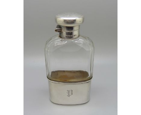 A cut glass and silver hip flask with engraved monogram, London 1916, 12cm 