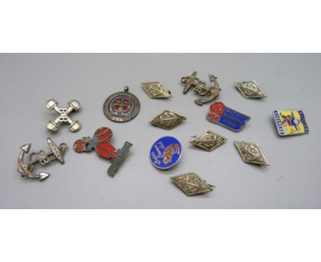 A silver and enamel Nottingham Schools Swimming fob medal, Butlins badges and Boys Brigade badges 