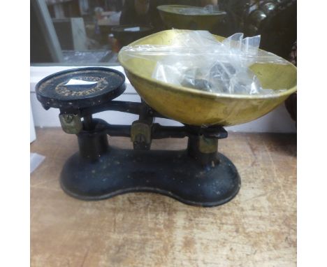 A pair of Boots of Nottingham kitchen scales and weights 