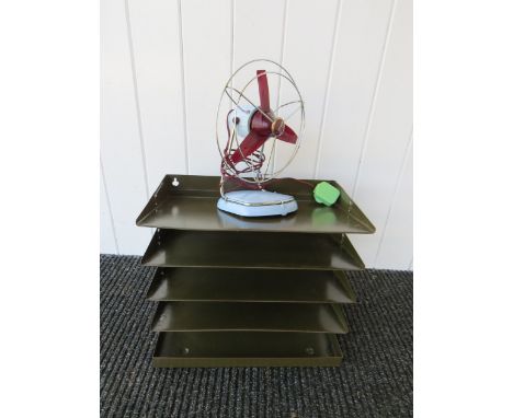 A industrial five shelf metal filing tray and blue Pifco retro fan 