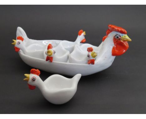 An Italian 1950's ceramic white glazed dish in the form of a chicken with six smaller dishes 