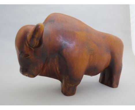 A West German ceramic bison with brown mottled glaze, 22cm high 