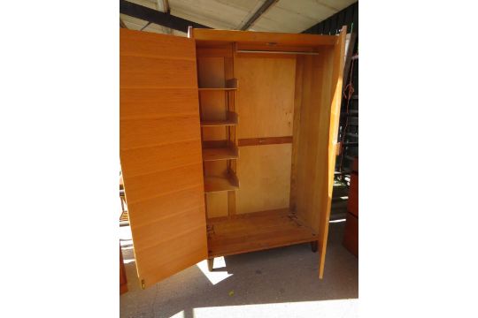 A Gordon Russell Of Broadway Oak Twin Door Wardrobe With Shelved