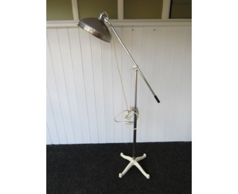 An industrial chrome, aluminium and steel adjustable standard light 