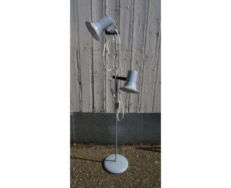 A grey standard light with twin adjustable spots 