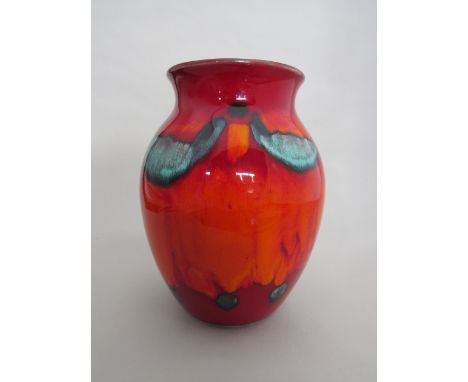 A Poole 'Volcano' range urn vase by Anita Harris. 20cm high